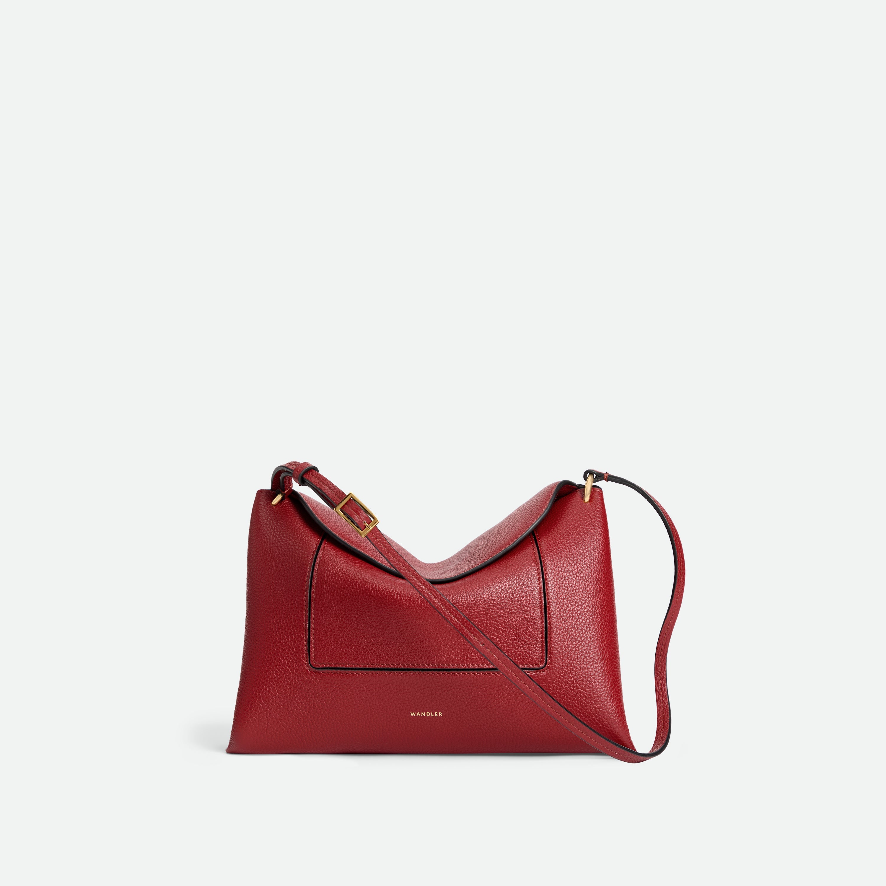 Wandler Penelope Slouch Bag in the color Scarlet Crust, made from calf leather with golden hardware and adjustable slim strap, front view.